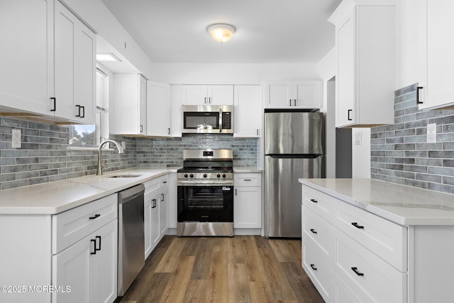 117 Clay Cir, Brick, NJ 08724 - kitchen featuring stainless steel appliances, tasteful backsplash, and light stone counters