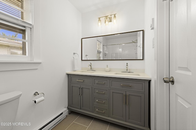 117 Clay Cir, Brick, NJ 08724 - full bath featuring double vanity, a shower, tile patterned floors, and baseboard heating