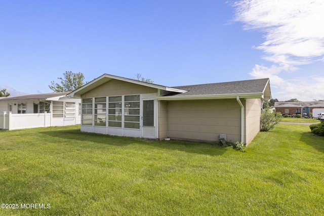 117 Clay Cir, Brick, NJ 08724 - back of property with roof with shingles and a sunroom