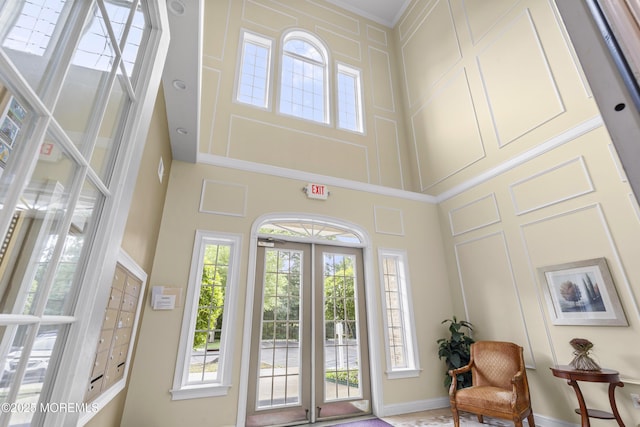 428 Sophee Ln, Lakewood, NJ 08701 - entryway featuring a towering ceiling and a decorative wall
