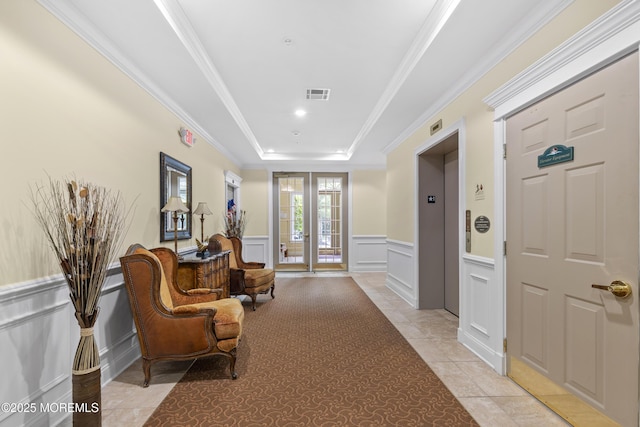 428 Sophee Ln, Lakewood, NJ 08701 - entryway featuring elevator, a decorative wall, wainscoting, a raised ceiling, and crown molding