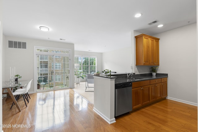 428 Sophee Ln, Lakewood, NJ 08701 - kitchen with dishwasher, brown cabinets, light wood-style flooring, a peninsula, and recessed lighting