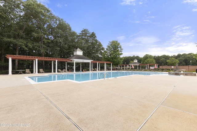 428 Sophee Ln, Lakewood, NJ 08701 - community pool with a gazebo, a patio area, a pergola, and view of scattered trees