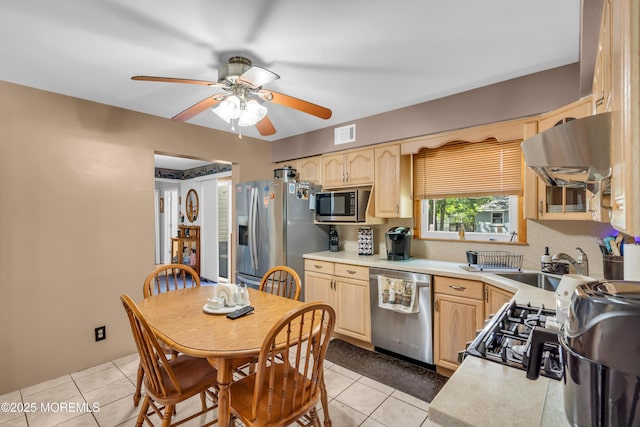 2010 Pine Meadow Ave, Toms River, NJ 08753 - kitchen with light brown cabinetry, stainless steel appliances, extractor fan, and ceiling fan