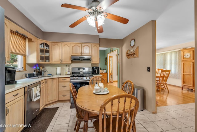 2010 Pine Meadow Ave, Toms River, NJ 08753 - kitchen with appliances with stainless steel finishes, under cabinet range hood, light brown cabinets, light tile patterned floors, and light countertops