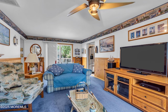 2010 Pine Meadow Ave, Toms River, NJ 08753 - living area with wainscoting, carpet, and a ceiling fan