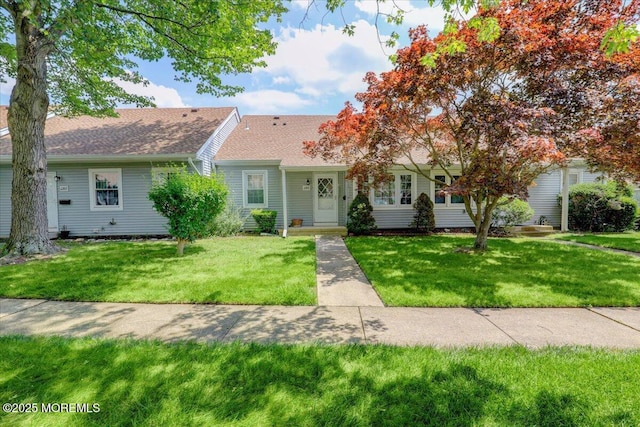 128 Korn Market Unit E, Freehold, NJ 07728 - view of front of property with a front lawn and roof with shingles