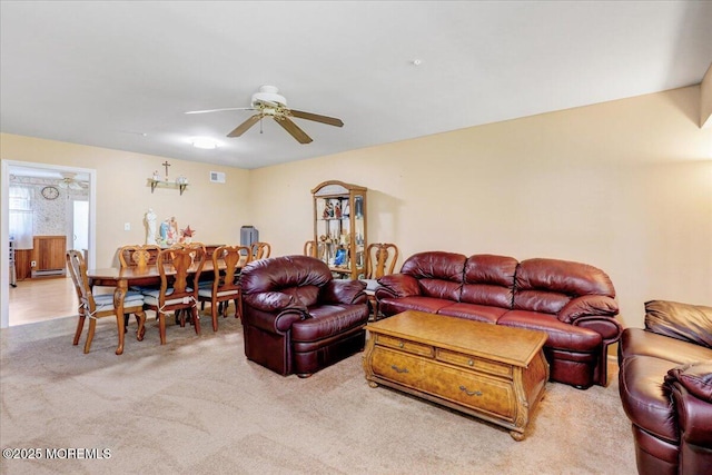 128 Korn Market Unit E, Freehold, NJ 07728 - living room with light colored carpet and ceiling fan