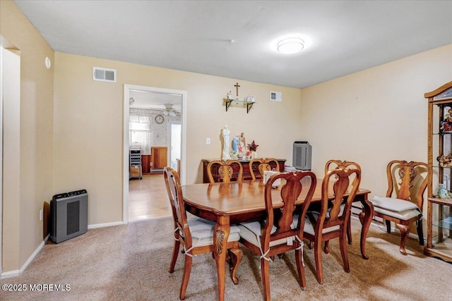 128 Korn Market Unit E, Freehold, NJ 07728 - dining room featuring light colored carpet and baseboards