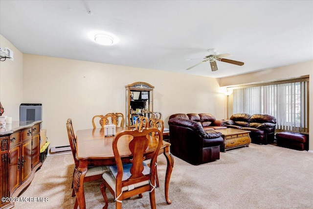 128 Korn Market Unit E, Freehold, NJ 07728 - dining room featuring light colored carpet, ceiling fan, and baseboard heating