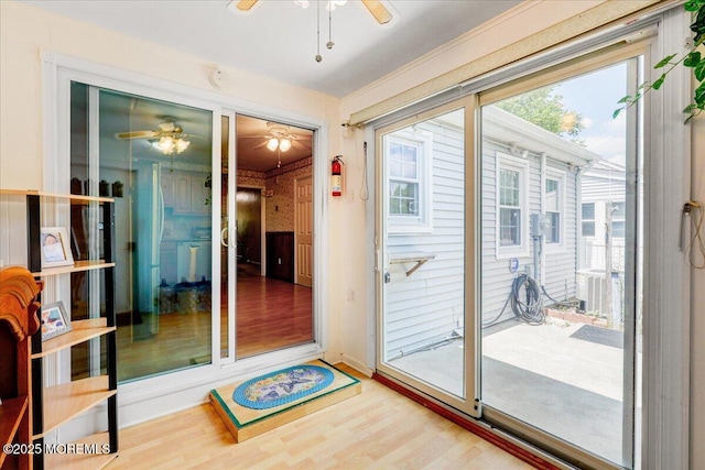 128 Korn Market Unit E, Freehold, NJ 07728 - entryway featuring a ceiling fan, wood finished floors, and crown molding