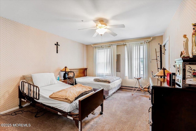 128 Korn Market Unit E, Freehold, NJ 07728 - bedroom featuring wallpapered walls, light carpet, ceiling fan, and baseboard heating