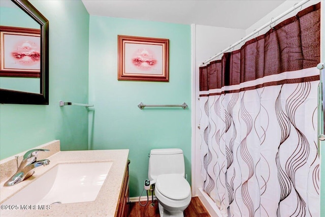 128 Korn Market Unit E, Freehold, NJ 07728 - bathroom with vanity, wood finished floors, and curtained shower