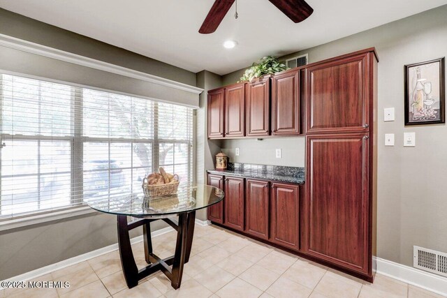 53 Grassmere Ct Unit 1, Freehold, NJ 07728 - kitchen featuring a ceiling fan and baseboards