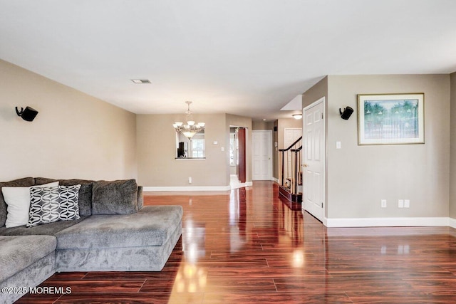 53 Grassmere Ct Unit 1, Freehold, NJ 07728 - living area with a chandelier and wood finished floors