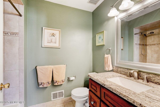 53 Grassmere Ct Unit 1, Freehold, NJ 07728 - bathroom with vanity, a tile shower, and tile patterned flooring