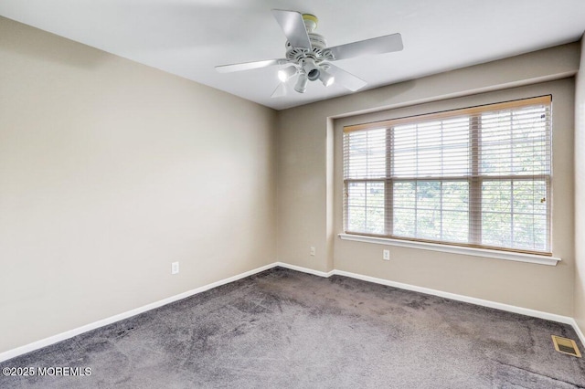 53 Grassmere Ct Unit 1, Freehold, NJ 07728 - empty room with a ceiling fan and dark carpet