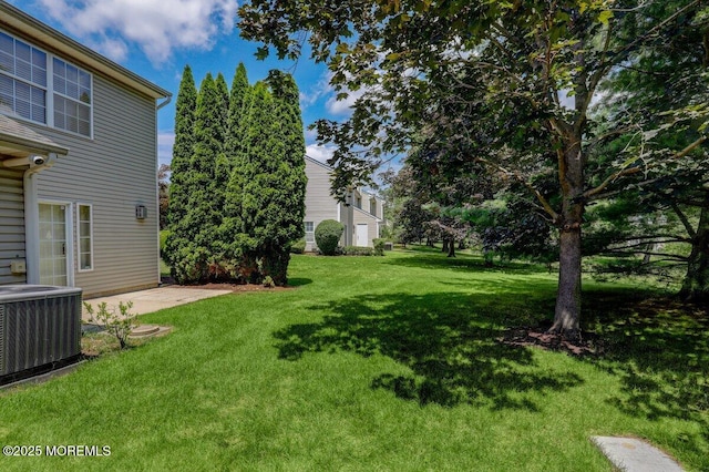 53 Grassmere Ct Unit 1, Freehold, NJ 07728 - view of grassy yard with a patio area