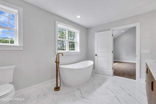 127 Rogers St, Bayville, NJ 08721 - bathroom featuring vanity, a freestanding tub, marble look tiles, and recessed lighting