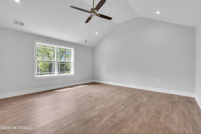 127 Rogers St, Bayville, NJ 08721 - unfurnished room featuring a ceiling fan, vaulted ceiling, recessed lighting, and wood finished floors