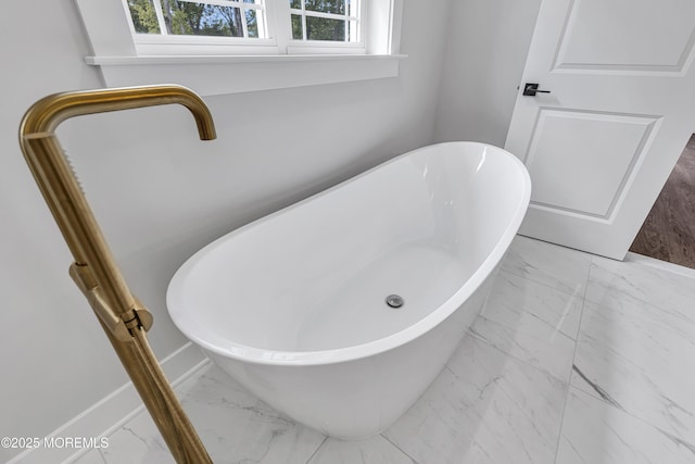 127 Rogers St, Bayville, NJ 08721 - full bath featuring marble look tile flooring and a freestanding tub