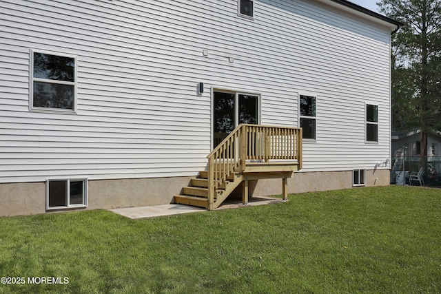 127 Rogers St, Bayville, NJ 08721 - rear view of house with a lawn