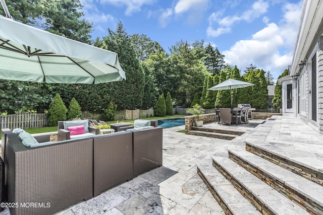 20 Wardell Ave, Rumson, NJ 07760 - fenced backyard with outdoor lounge area, outdoor dining area, a patio, and view of scattered trees