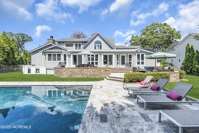 20 Wardell Ave, Rumson, NJ 07760 - back of property featuring area for grilling, a patio area, a chimney, and outdoor lounge area