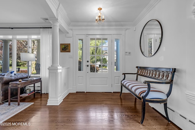 20 Wardell Ave, Rumson, NJ 07760 - foyer entrance featuring ornate columns, crown molding, a chandelier, and wood finished floors