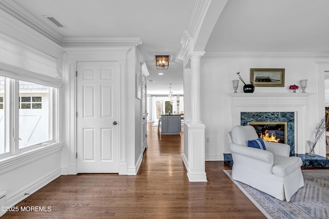 20 Wardell Ave, Rumson, NJ 07760 - hallway featuring decorative columns, wood finished floors, and ornamental molding