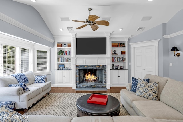 20 Wardell Ave, Rumson, NJ 07760 - living area with lofted ceiling, wood finished floors, a lit fireplace, ceiling fan, and built in shelves