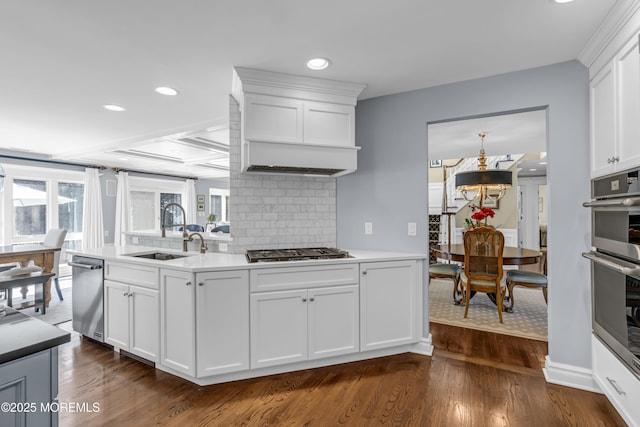 20 Wardell Ave, Rumson, NJ 07760 - kitchen featuring appliances with stainless steel finishes, dark wood-style floors, recessed lighting, backsplash, and white cabinets