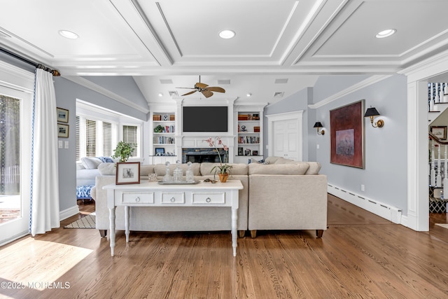 20 Wardell Ave, Rumson, NJ 07760 - living room with a baseboard heating unit, a ceiling fan, a fireplace, dark wood-style floors, and built in features