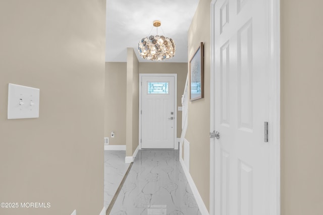 1066 Windlass Dr, Manahawkin, NJ 08050 - doorway to outside with light marble finish flooring and a chandelier