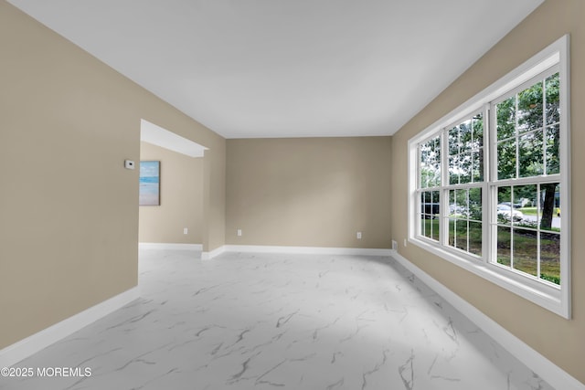 1066 Windlass Dr, Manahawkin, NJ 08050 - empty room featuring light marble finish floors and plenty of natural light