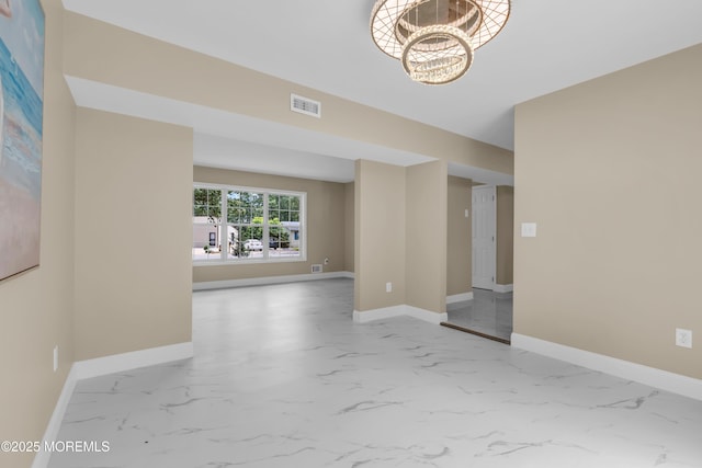 1066 Windlass Dr, Manahawkin, NJ 08050 - unfurnished room featuring marble look tiles and a chandelier