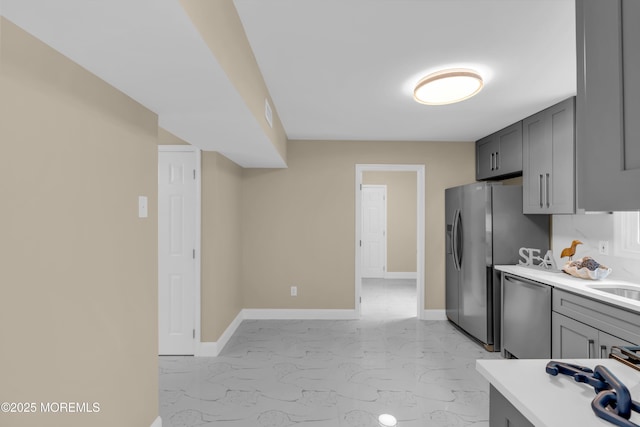 1066 Windlass Dr, Manahawkin, NJ 08050 - kitchen with gray cabinets, light marble finish floors, light countertops, and dishwasher