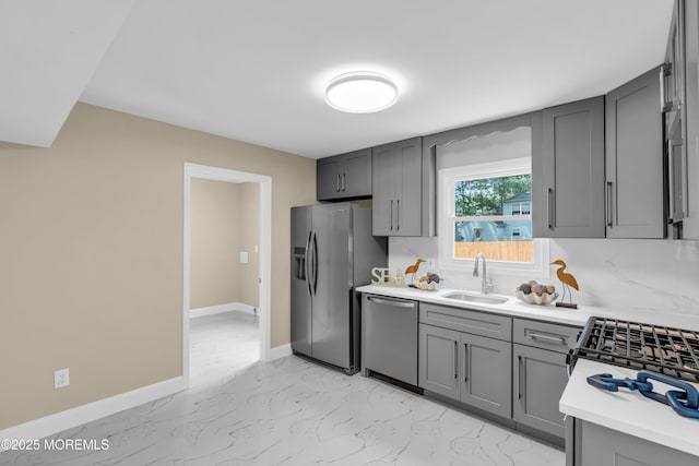 1066 Windlass Dr, Manahawkin, NJ 08050 - kitchen featuring gray cabinets, light marble finish floors, light countertops, and stainless steel dishwasher