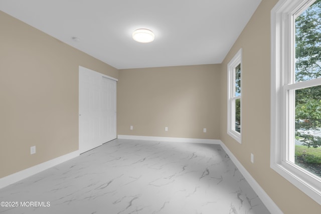 1066 Windlass Dr, Manahawkin, NJ 08050 - empty room with marble look tiles