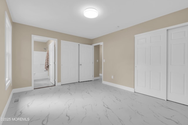 1066 Windlass Dr, Manahawkin, NJ 08050 - unfurnished bedroom with marble look tiles and connected bathroom