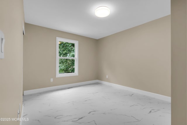 1066 Windlass Dr, Manahawkin, NJ 08050 - empty room featuring marble look tile flooring and baseboards