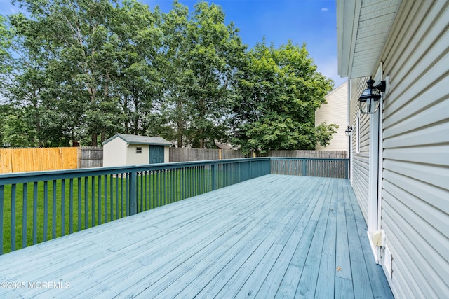 1066 Windlass Dr, Manahawkin, NJ 08050 - wooden deck featuring a storage shed and a fenced backyard