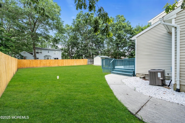 1066 Windlass Dr, Manahawkin, NJ 08050 - fenced backyard with a storage unit and a wooden deck