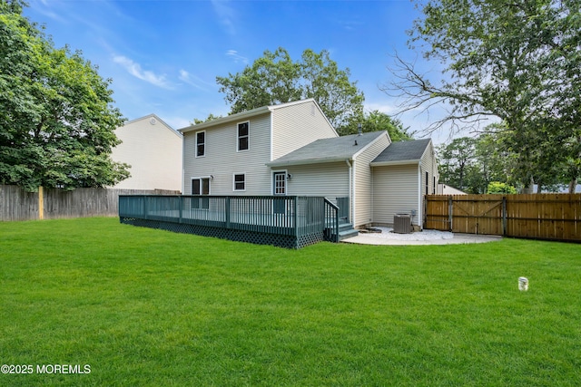 1066 Windlass Dr, Manahawkin, NJ 08050 - rear view of property featuring a fenced backyard, a deck, a patio area, and roof with shingles