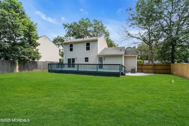 1066 Windlass Dr, Manahawkin, NJ 08050 - back of property featuring a fenced backyard and a wooden deck