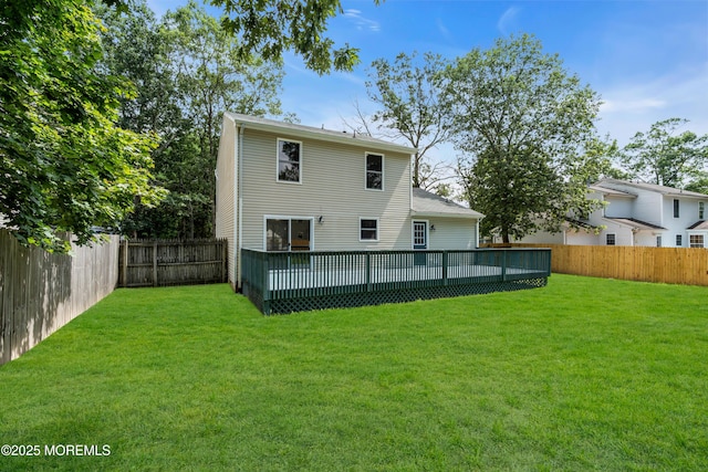 1066 Windlass Dr, Manahawkin, NJ 08050 - back of property featuring a fenced backyard and a deck