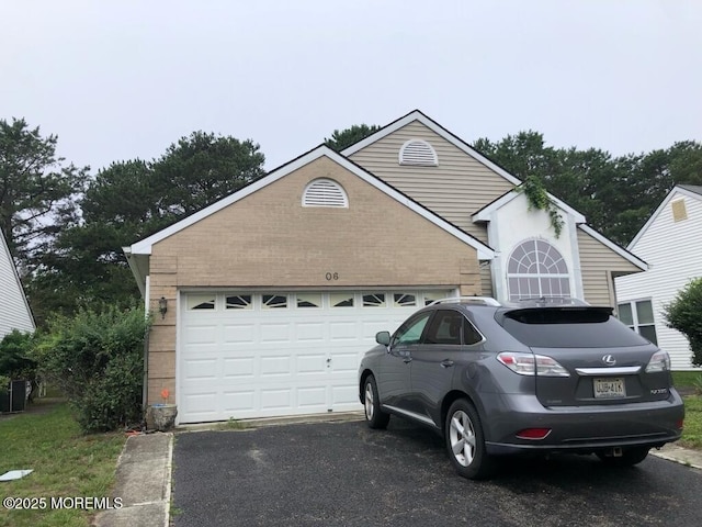 106 Narberth Way, Toms River, NJ 08757 - view of front of property featuring driveway and an attached garage
