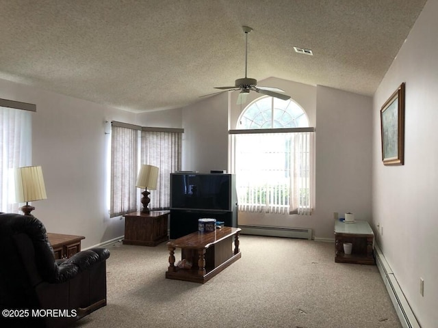 106 Narberth Way, Toms River, NJ 08757 - living room with baseboard heating, carpet flooring, a textured ceiling, ceiling fan, and vaulted ceiling