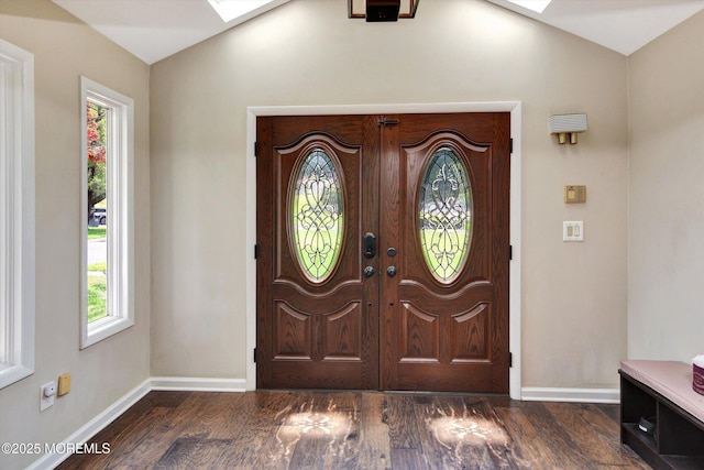 25 Forman Ln, Manalapan, NJ 07726 - entryway featuring a skylight, vaulted ceiling, plenty of natural light, and dark wood-style floors