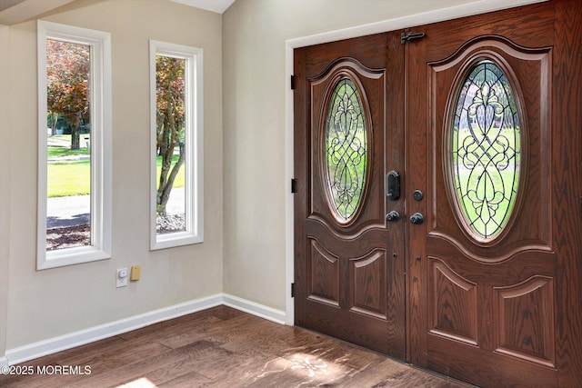 25 Forman Ln, Manalapan, NJ 07726 - foyer with baseboards and dark wood-style flooring